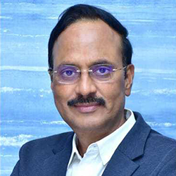Portrait of Jitendra Kumar Mohanty in a dark suit and white shirt